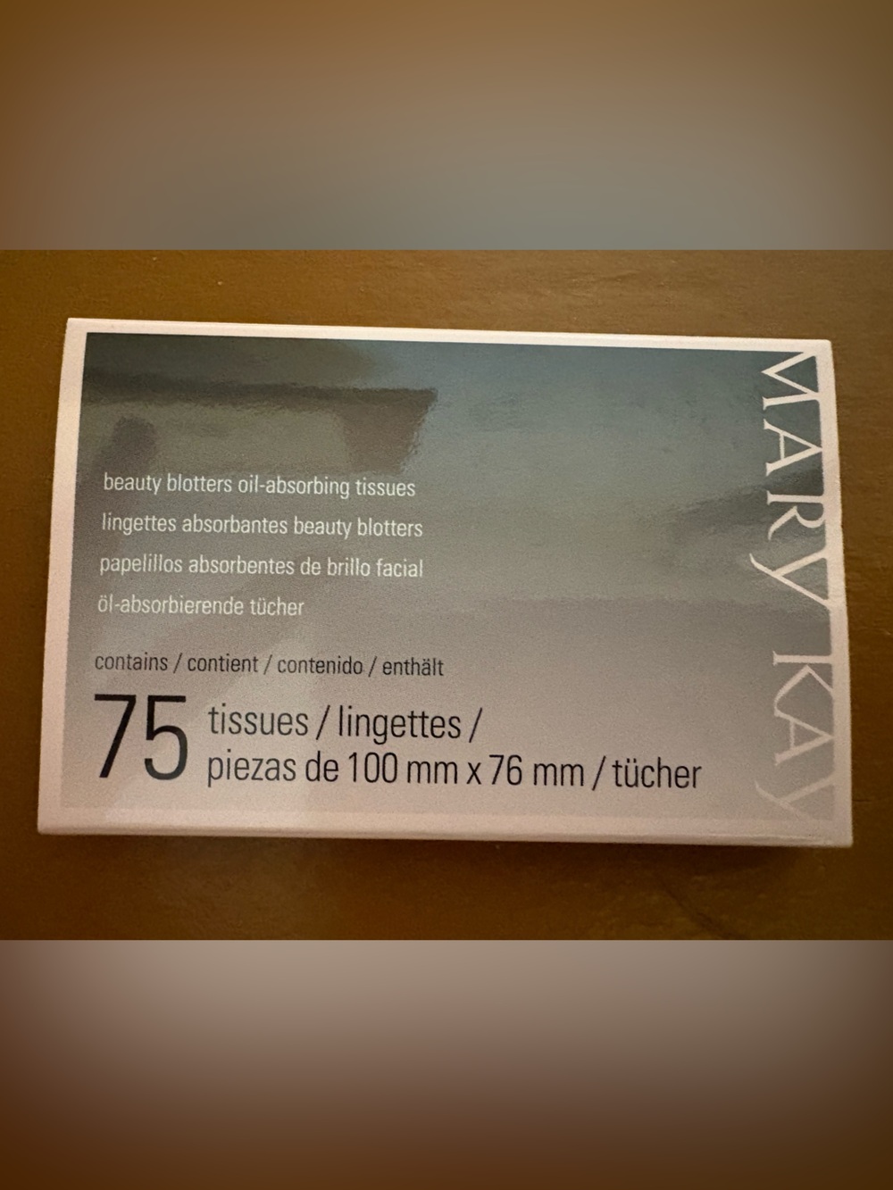 Mary Kay Oil-Absorbing Facial Tissues in Black and Beige Packaging